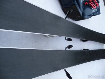 282. Lyže NORDICA - 130 cm + boty ATOMIC 38 eu - set - 8