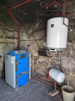 Prodej rodinného domu 6+1 se zahradou, obec Holedeč u Žatce - 8