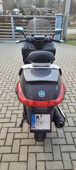 Piaggio Xevo 250ie - 8