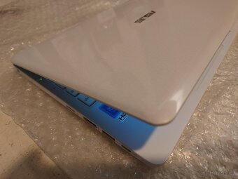 Asus E203N - 8