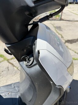 Peugeot Tweet 125 r. 2014 - 8