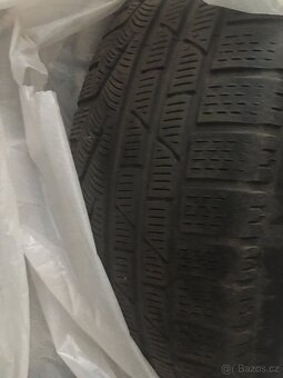 Prodám zimní pneu pirelli 225/55/17 - 8