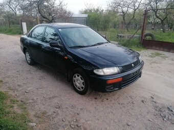 Mazda 323 - 8