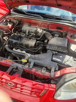 Hyundai acent 1.4 rok 2004 - 8