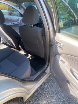 Nissan almera 1.5 dci - 8