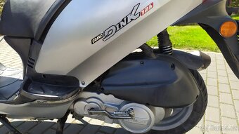 Kymco Grand Dink 125 - 8