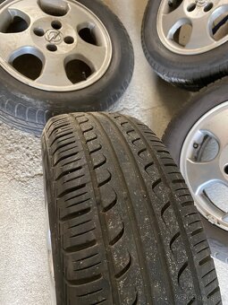 Kompletní sada kol Opel Astra – lité disky + letní Pirelli - 8