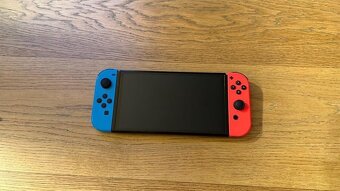 Nintendo Switch OLED + 7 her - 8