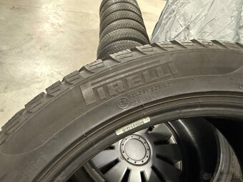 prodám zimní 235/45/18 Goodyear a Pirelli - - 8