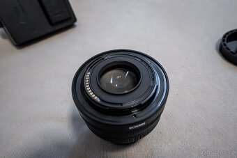 Prodám Nikon Z50 + 2 objektivy (16-50mm a 12-28mm) + přísluš - 8