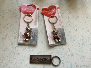 Šálek s podšálkem, svíčka, Tchibo dóza, klíčenka - 8