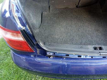 Nissan Almera 1,5 - 8
