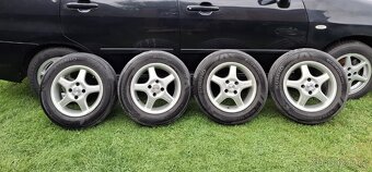 Prodám Suzuki Liana 1,6i , 4x4 , dovoz - 8