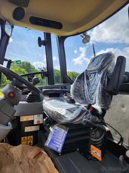 KLOUBOVÝ NAKLADAČ JCB 409 - 8