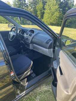 Suzuki ignis 1.5i 4x4 - 8