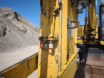 Kolové rypadlo CAT M315 - 8