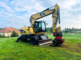 Kolové rypadlo Caterpillar M315D - 8