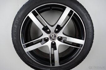 Opel Astra - 17" alu kola - Letní pneu - 8