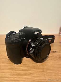 Sony Alpha A300 + 3 objektivy (včetně Minolta 50mm) + batoh - 8
