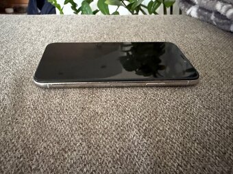 iPhone XS 64Gb - 8