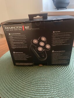 Novy nepouzivany strojek Remington - 8
