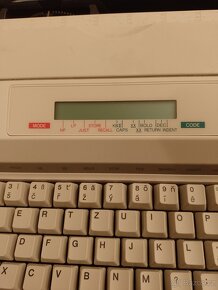 Elektrický kufříkový psací stroj Olympia plně funkční - 8
