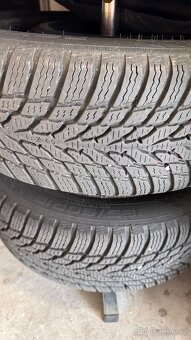 Nokian snowproof 185/60/15 s plechy na Fabia III - 8