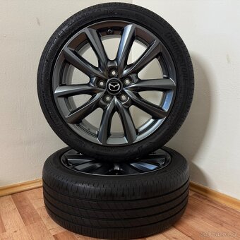 MAZDA 3 5x114,3 R18 ET45+LETNÍ 215/45R18 7,5mm - 8