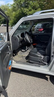 Pordám Suzuki Jimny 2006 - 8