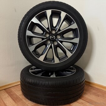 MAZDA CX-3 5x114,3 R18 ET50+LETNÍ 215/50R18 6,5mm - 8