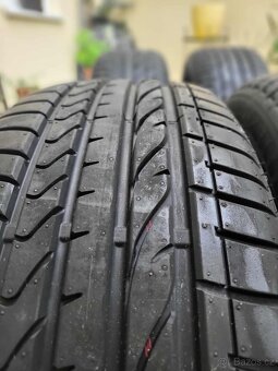 Letni Bridgestone 235/55/19 - 8