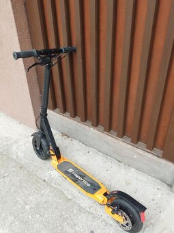 Skládací koloběžka s odpružením a brzdami - 8