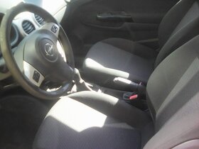 opel corsa 1.0,44kw,r.v.5-09,127000km. - 8