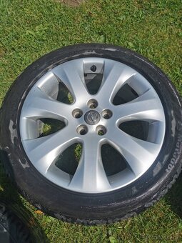 Alu Opel 215/50 r17 - 8