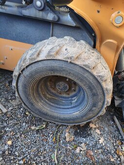 Smykový nakladač 12-16.5 - 8