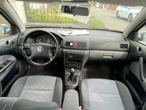 Škoda Octavia Combi,1.6 75kW,Digitální klima,Tempomat,Xenony - 8