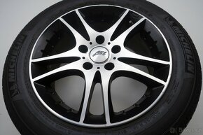 Opel Astra - 16" alu kola - Letní pneu - 8