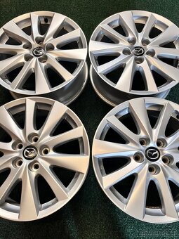 5x114,3 R17 Orig. alu disky Mazda - ET 50 - 8
