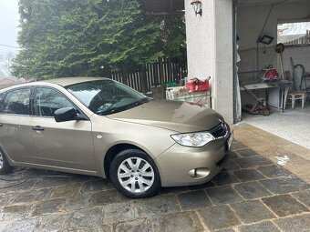 Subaru Impreza 1,6 benzín 2009 - 8