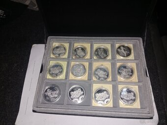 Stříbrné mince 24 kusů - 8