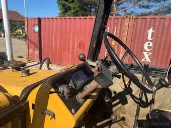 Traktorbagr Ford 555 , klapačka, pohon 4x2 - 8