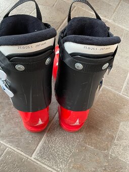 Lyže 140 cm + lyžáky 38-39. Použité jeden týden. - 8