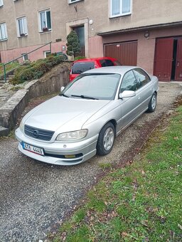 Opel omega b 2.5 děti manual - 8