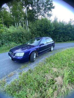 Subaru Legacy.  2.0l 92kw - 8