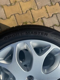Litá kola 17” Ford s letními pneumatikami - 8