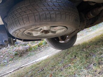 Mazda Tribute 2,3 - 8
