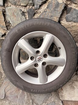 Suzuki SX4 16” original kola, letní pneu - 8