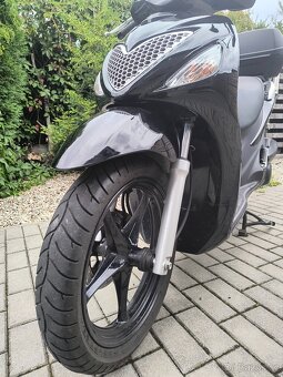Suzuki sixteen UX 125 2013 - 8