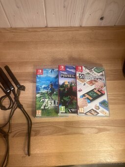 Nintendo switch OLED + hry a joy sticky na víc - 8