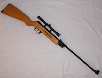 Vzduchovka GAMO s optikou 4x20. - 8